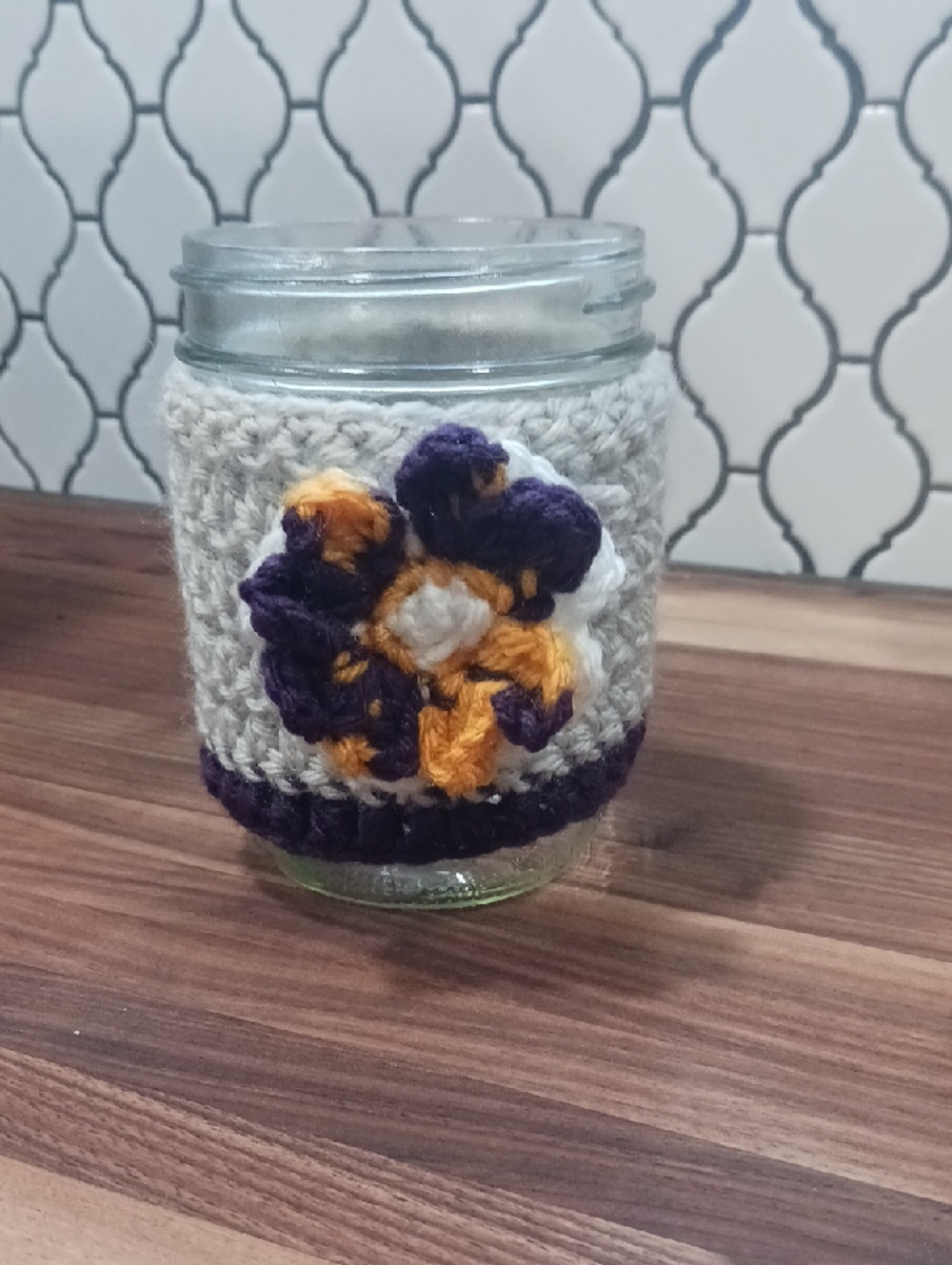 Handmade Cozy with Purple White, and Yellow Pansy Flower
